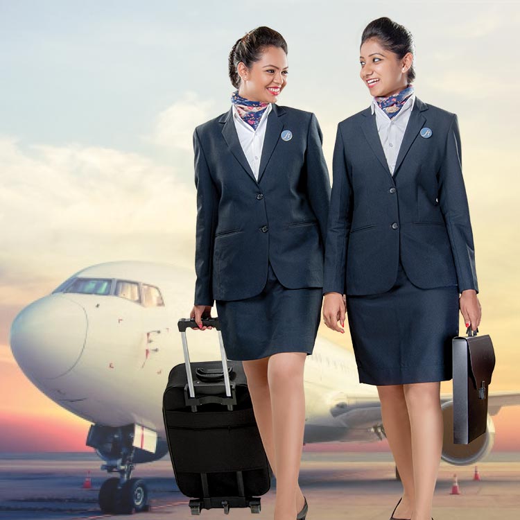 The image shows two air hostesses wearing uniforms with an airplane behind them. Both of them are smiling and looking at each other